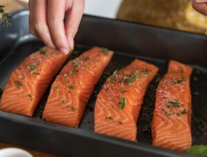 Salmon fillets with herbs on top